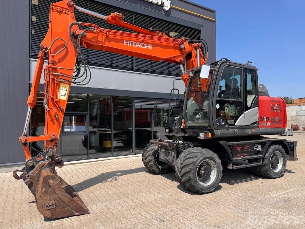 Hitachi 140W Колёсные экскаваторы