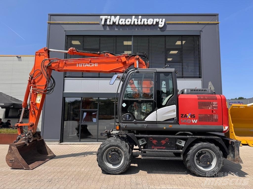 Hitachi 140W Колёсные экскаваторы