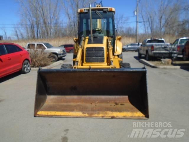New Holland 575 E Экскаваторы-погрузчики