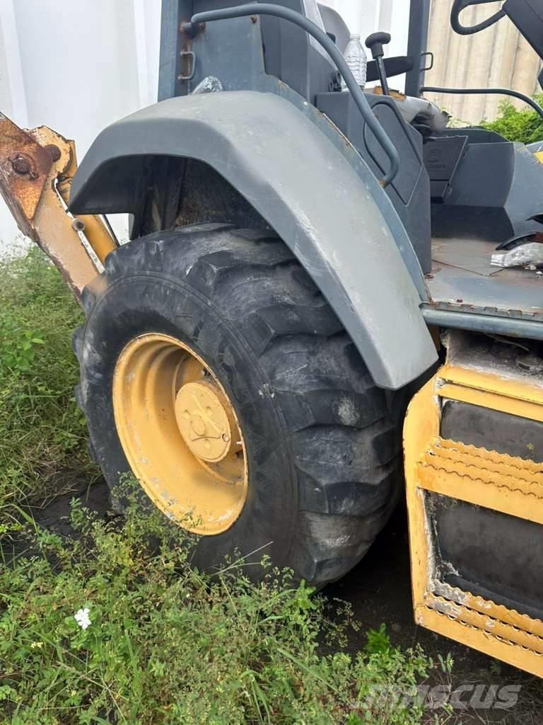 John Deere 310 K Экскаваторы-погрузчики