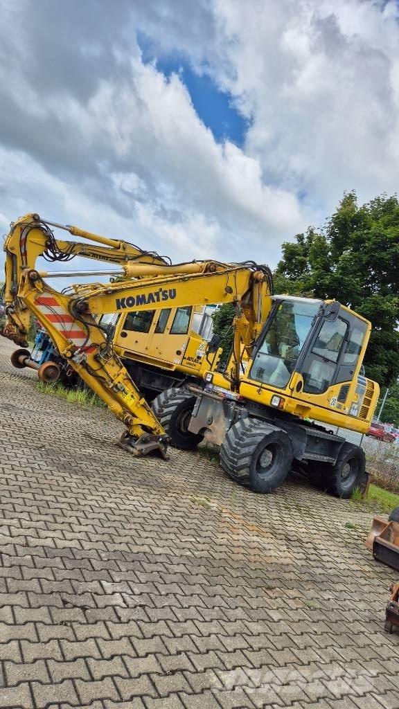 Komatsu PW148-8 Колёсные экскаваторы