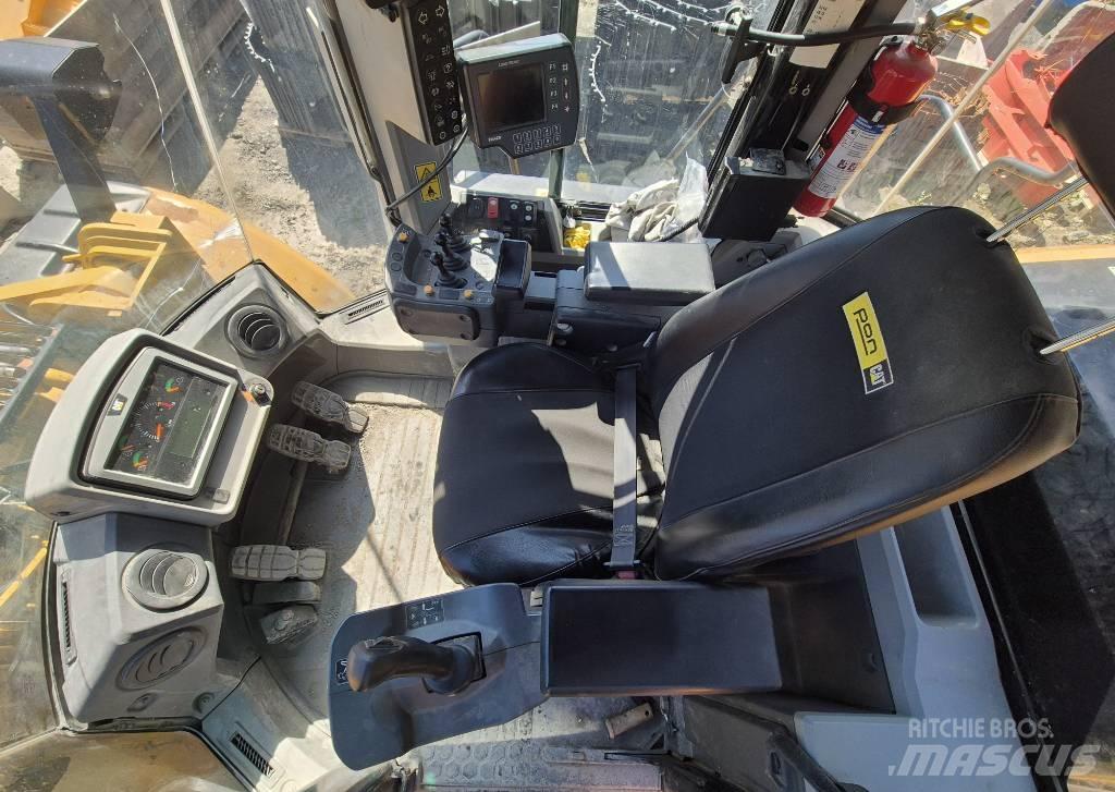 CAT 966M Фронтальные погрузчики