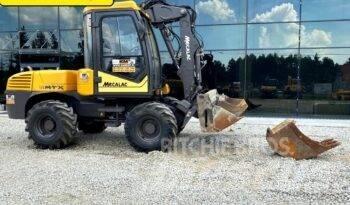 Mecalac 12 M TX Экскаваторы-погрузчики