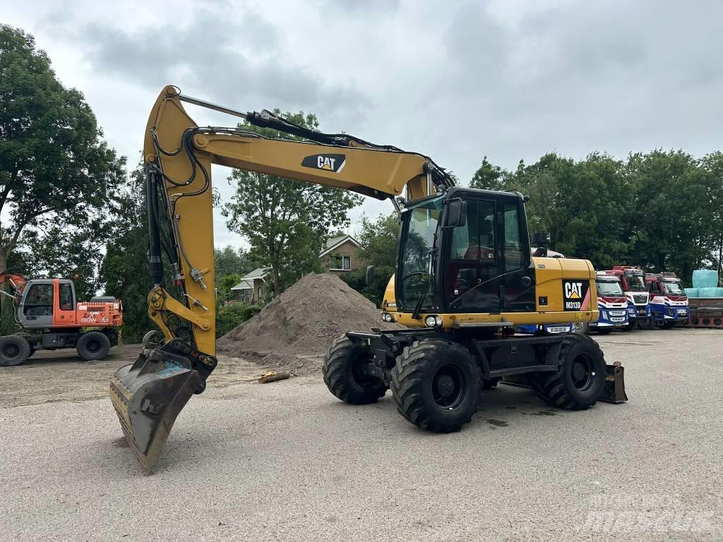 CAT M 313 D Колёсные экскаваторы