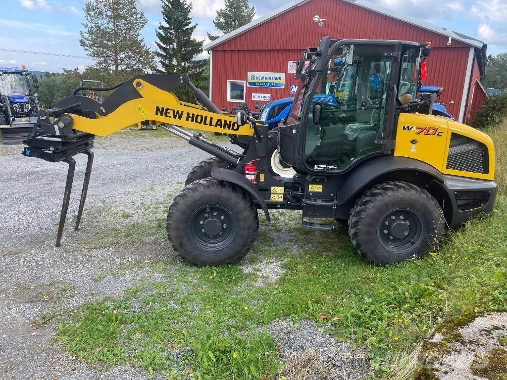 New Holland W70C Фронтальные погрузчики