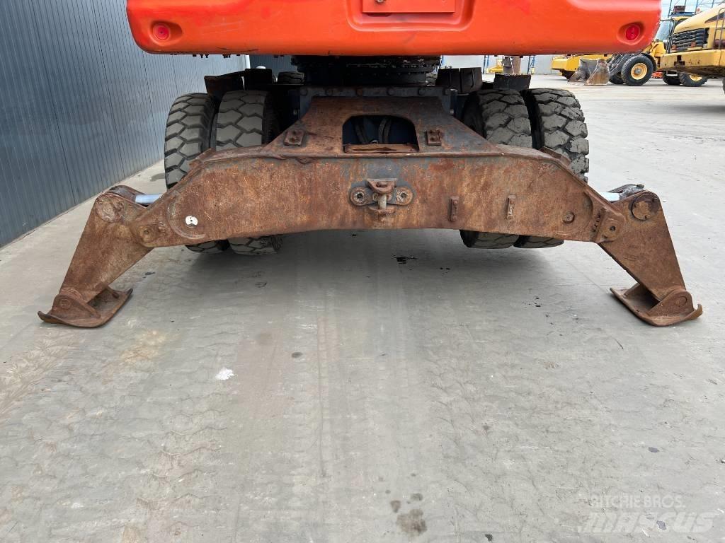 Doosan DX210W Колёсные экскаваторы