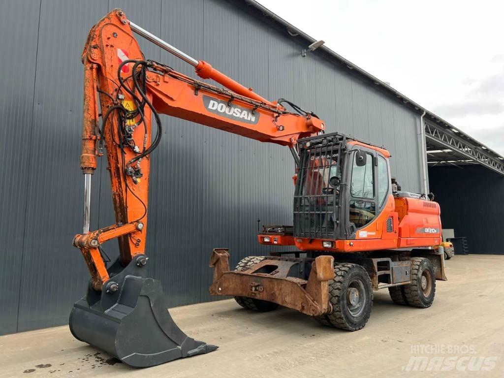 Doosan DX210W Колёсные экскаваторы