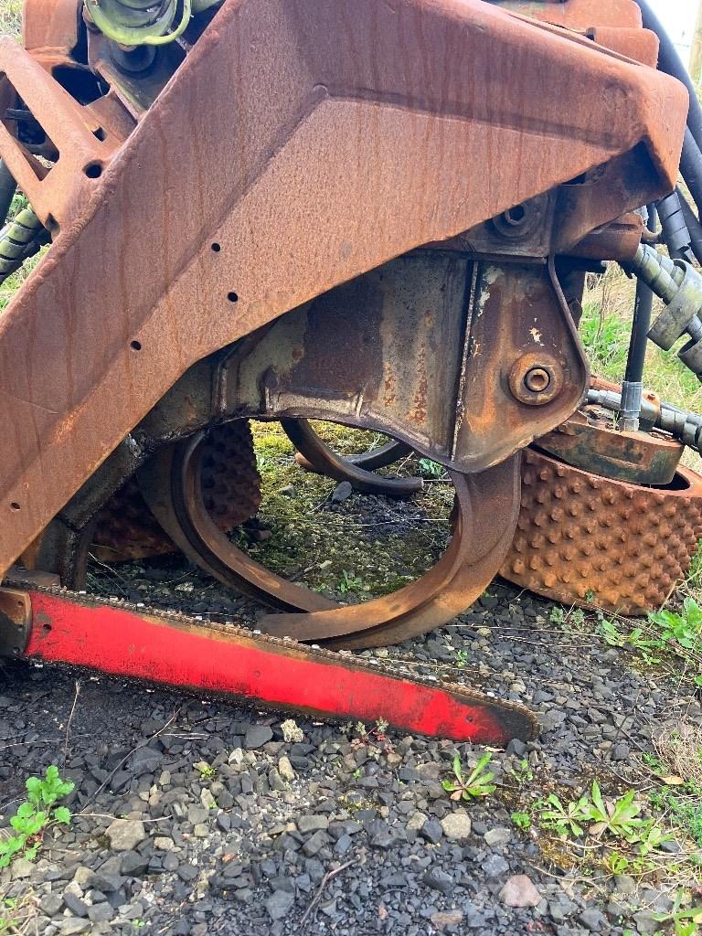 Komatsu 370.2 Харвестерные головки