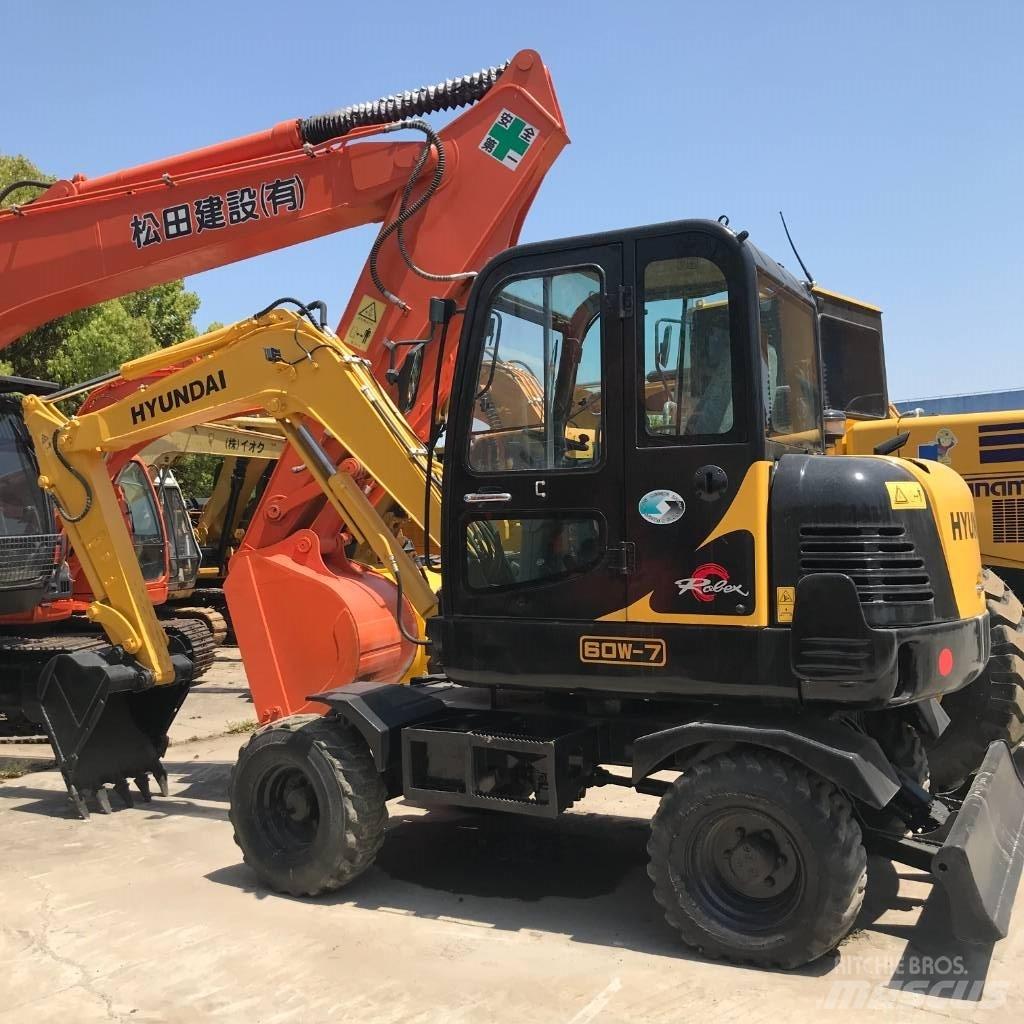Hyundai 60 W Колёсные экскаваторы