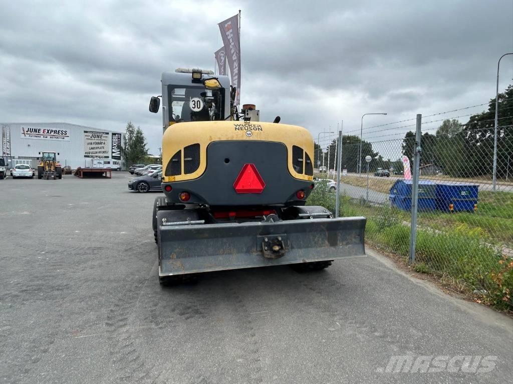 Wacker Neuson EW100 Колёсные экскаваторы