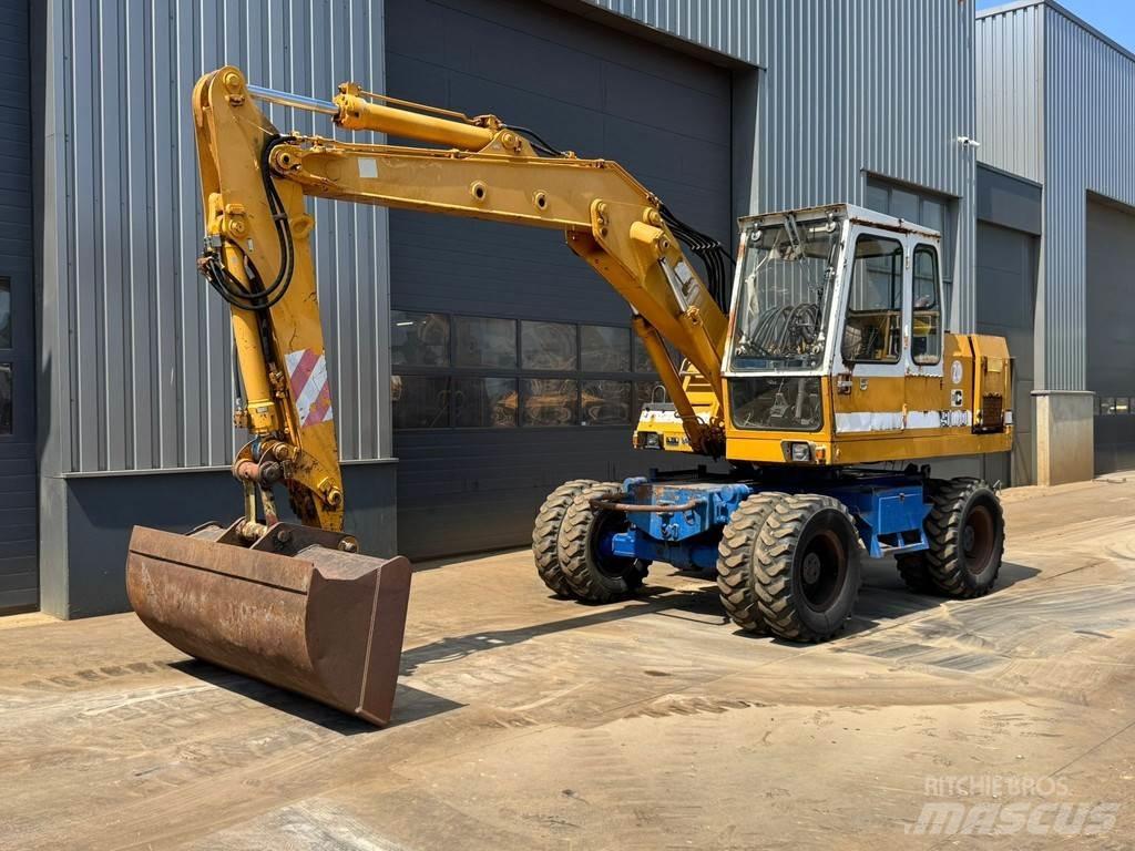 Liebherr A900C Колёсные экскаваторы