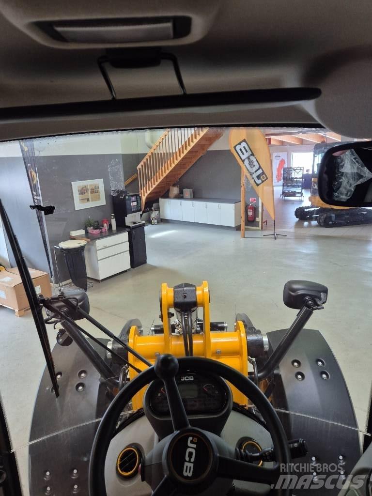 JCB 409 Фронтальные погрузчики