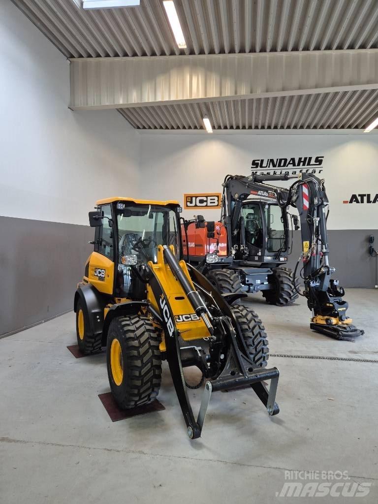 JCB 409 Фронтальные погрузчики