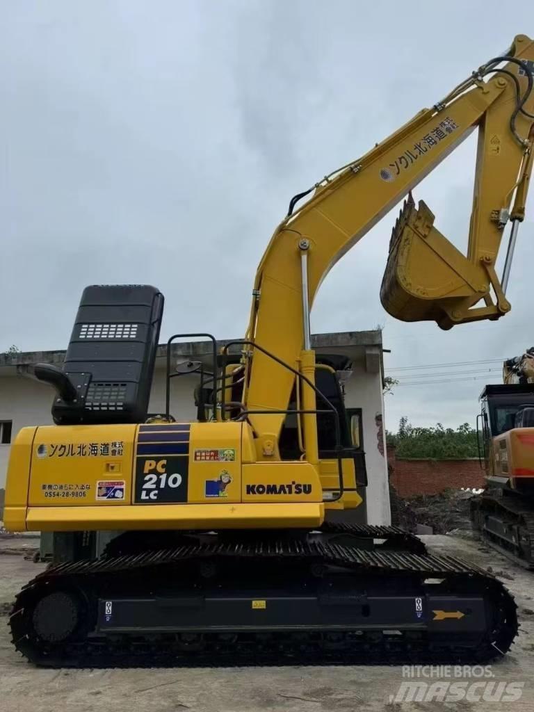 Komatsu 210LC-8 Гусеничные экскаваторы