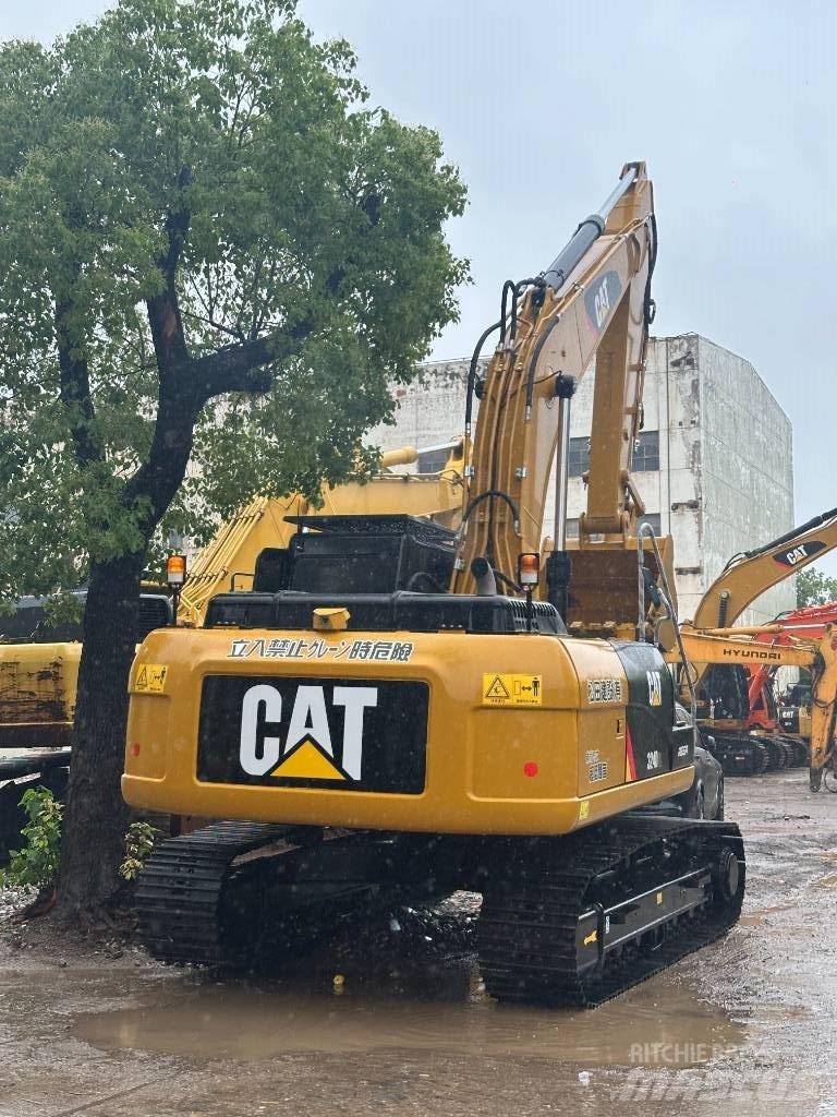 CAT CAT324D Малые экскаваторы 7т-12т