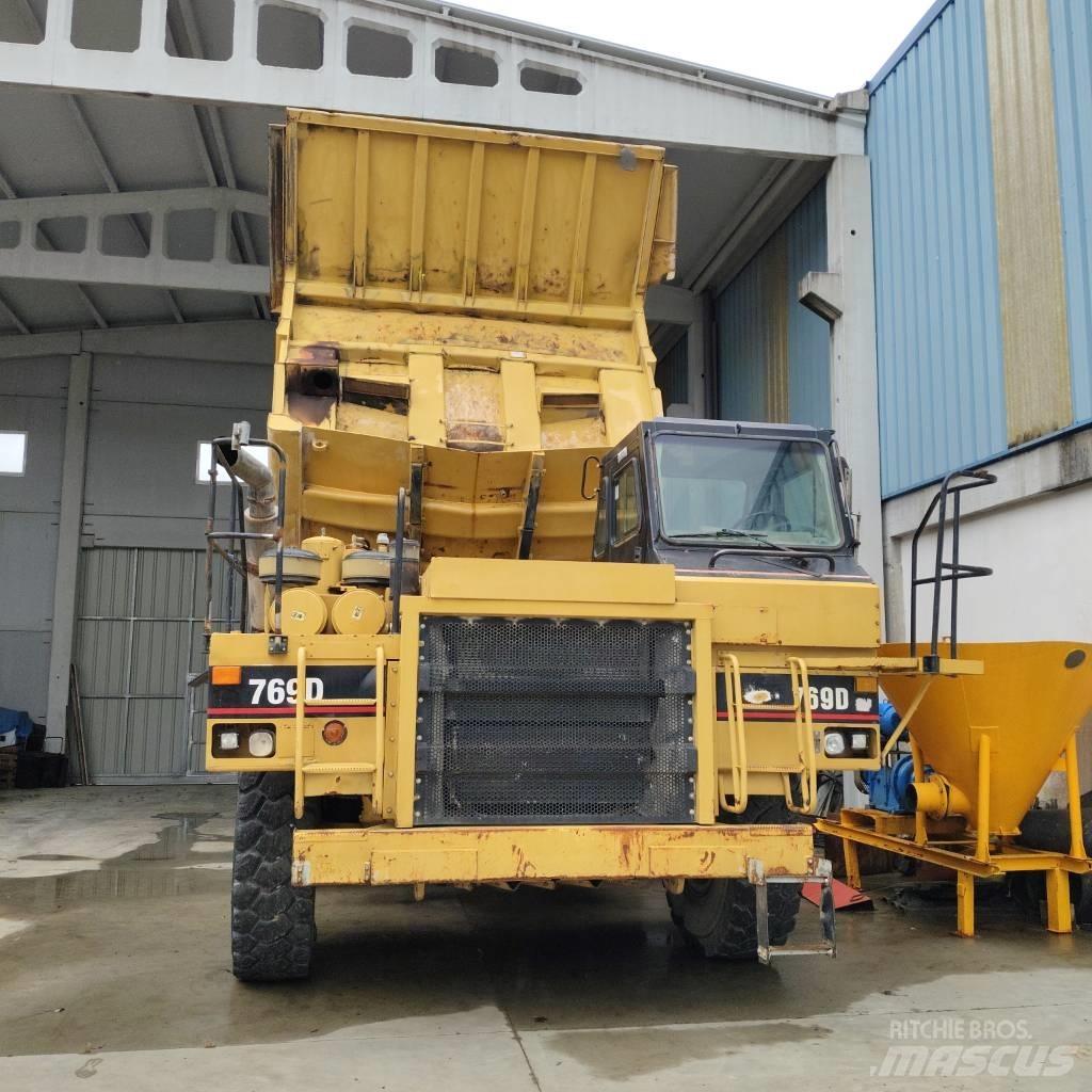 CAT 769 D Карьерные самосвалы