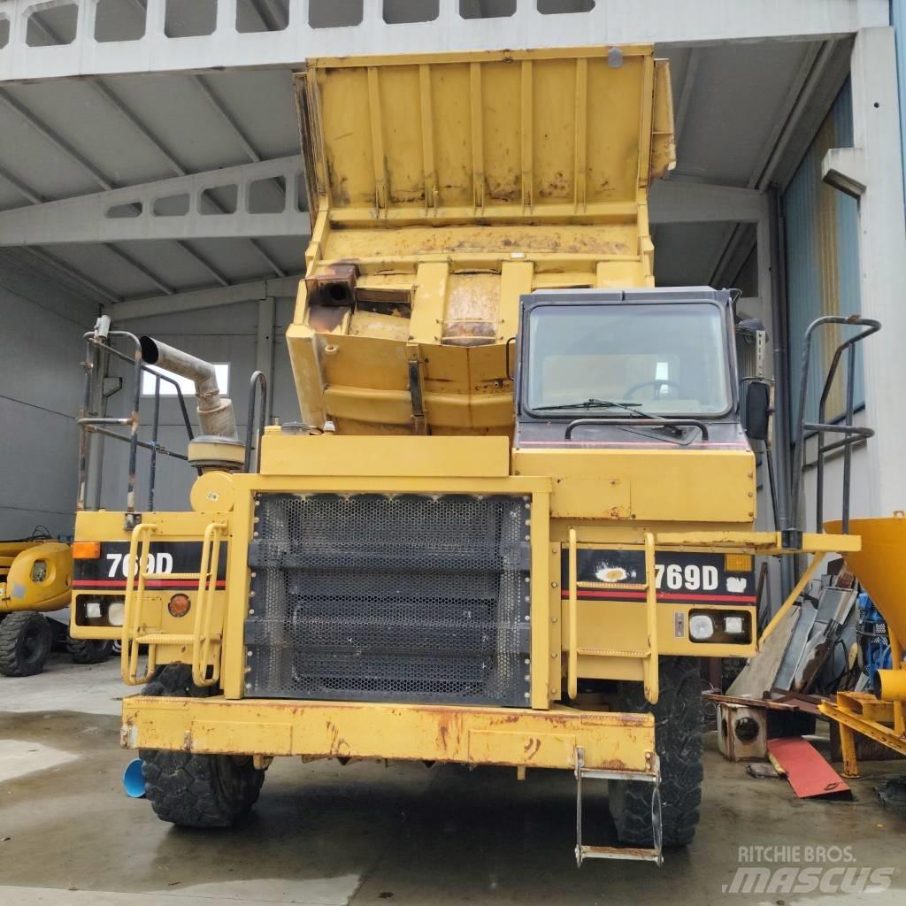 CAT 769 D Карьерные самосвалы