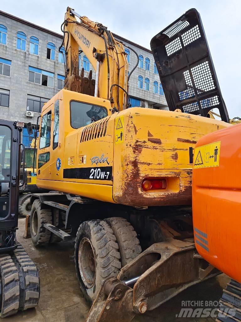 Hyundai R210W-7 Колёсные экскаваторы