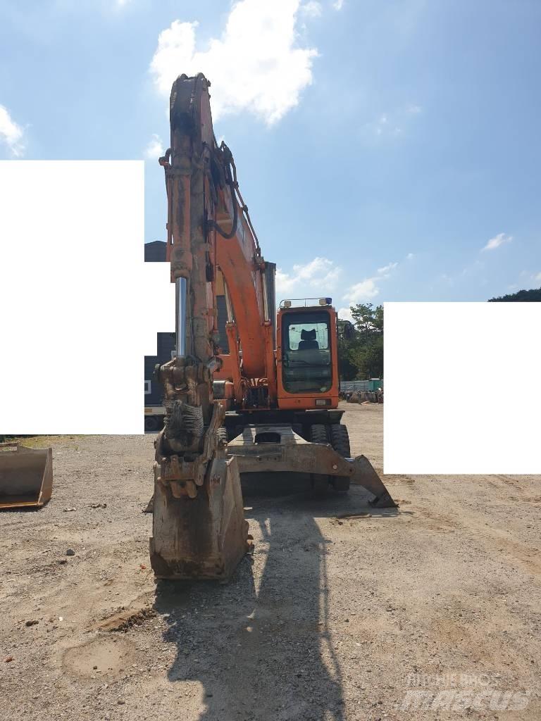 Doosan DX210WA Колёсные экскаваторы