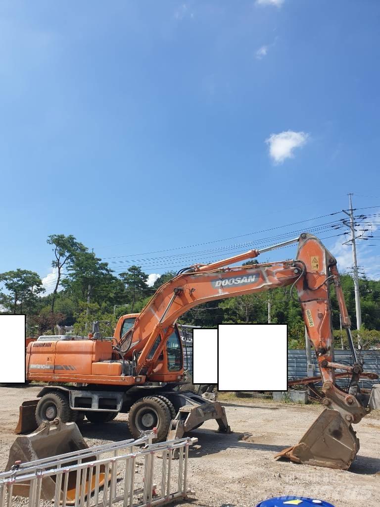 Doosan DX210WA Колёсные экскаваторы