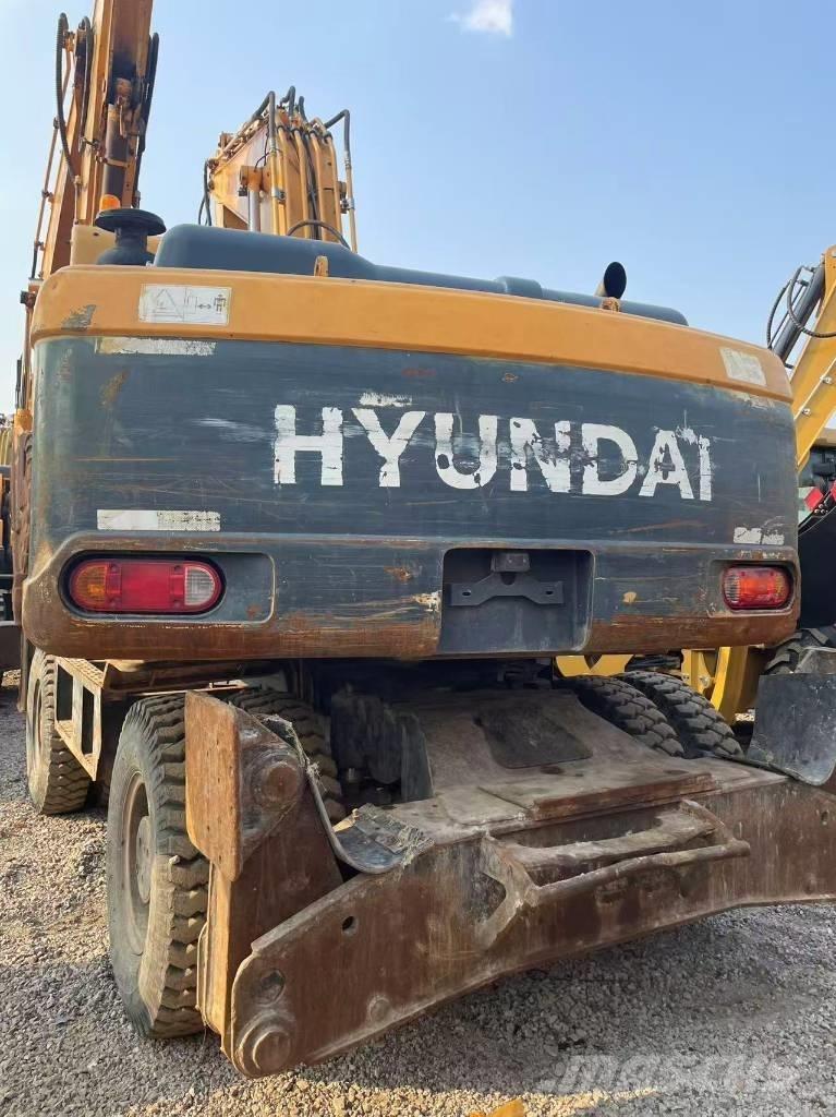 Hyundai 210W-9 Колёсные экскаваторы
