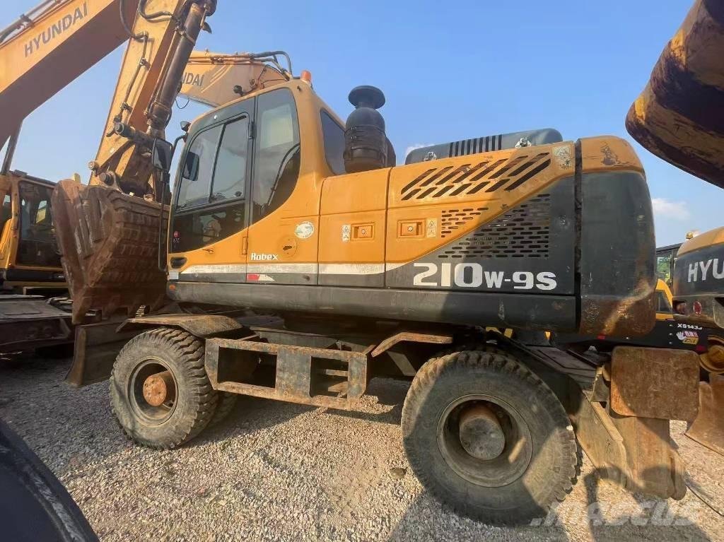 Hyundai 210W-9 Колёсные экскаваторы