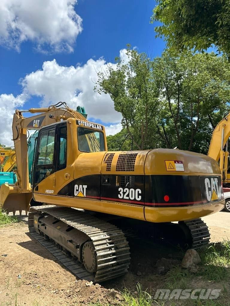 CAT CAT320C Малые экскаваторы 7т-12т
