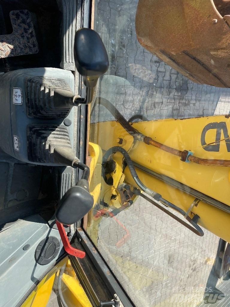 New Holland LB 110 Экскаваторы-погрузчики