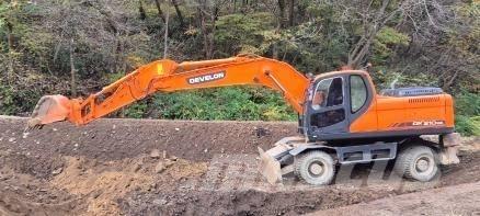 Doosan DX210WA Колёсные экскаваторы