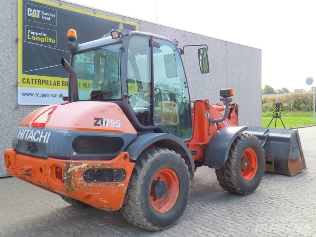 Hitachi ZX 95 Фронтальные погрузчики