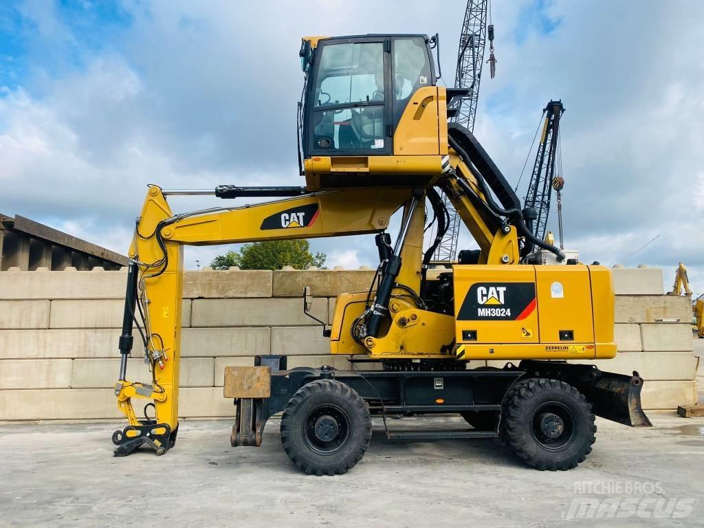 CAT mh3024 Колёсные экскаваторы