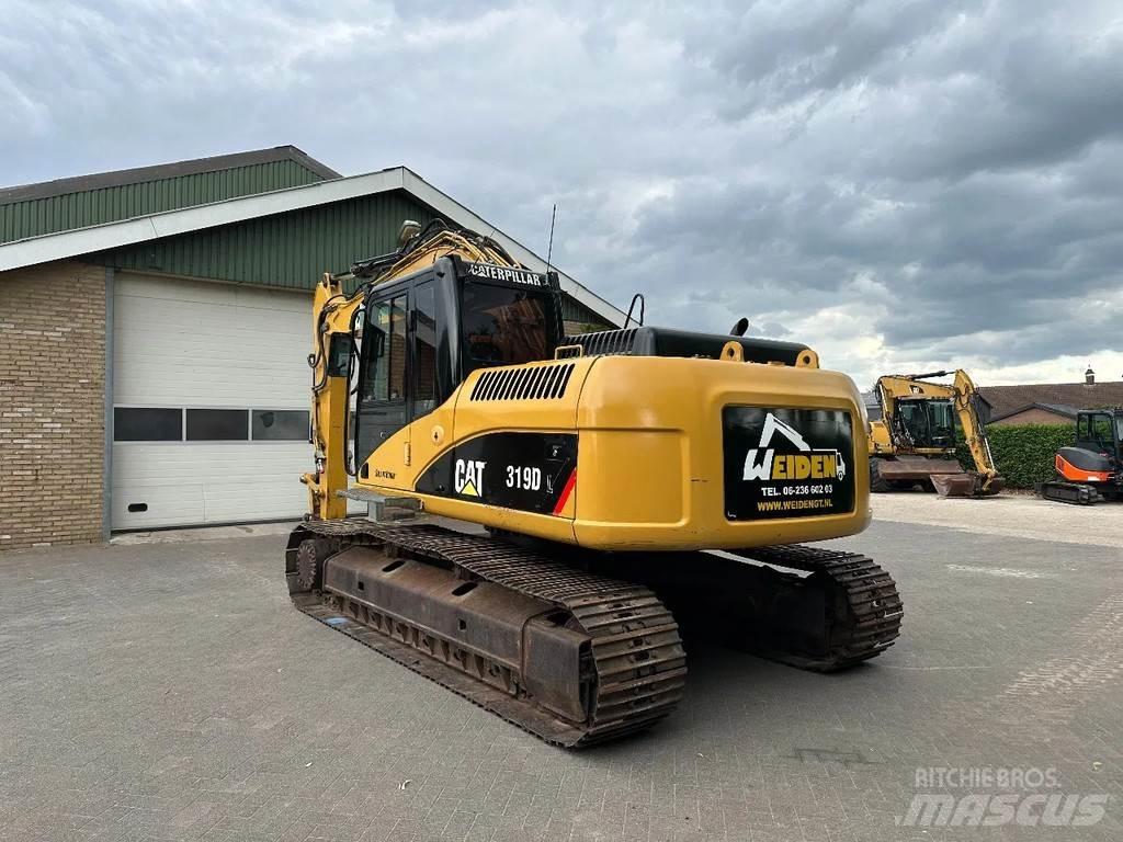 CAT 319D Гусеничные экскаваторы