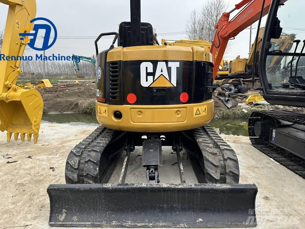 CAT 303 CR Мини-экскаваторы