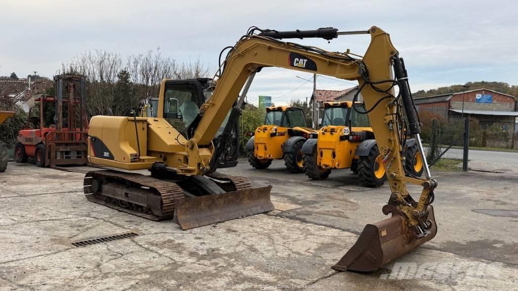 CAT 307 Малые экскаваторы 7т-12т