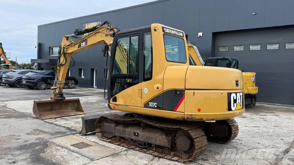 CAT 307 Малые экскаваторы 7т-12т