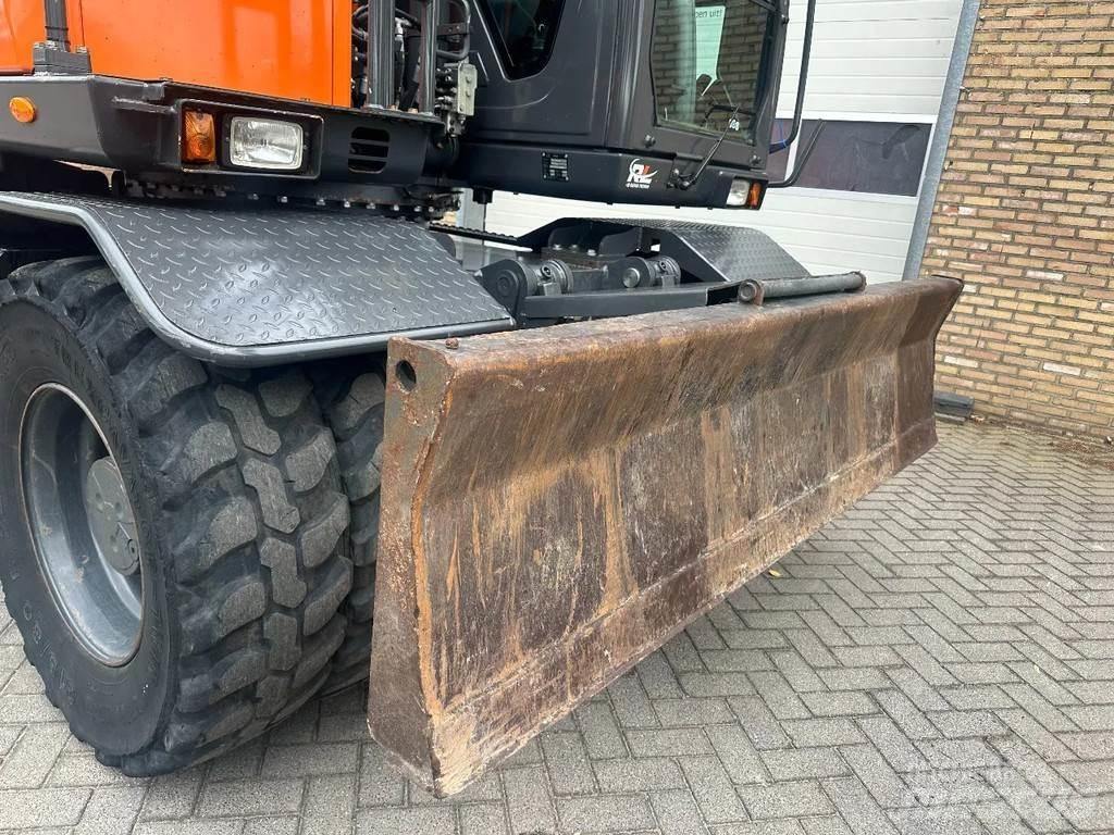 Doosan DX140W-5 Колёсные экскаваторы
