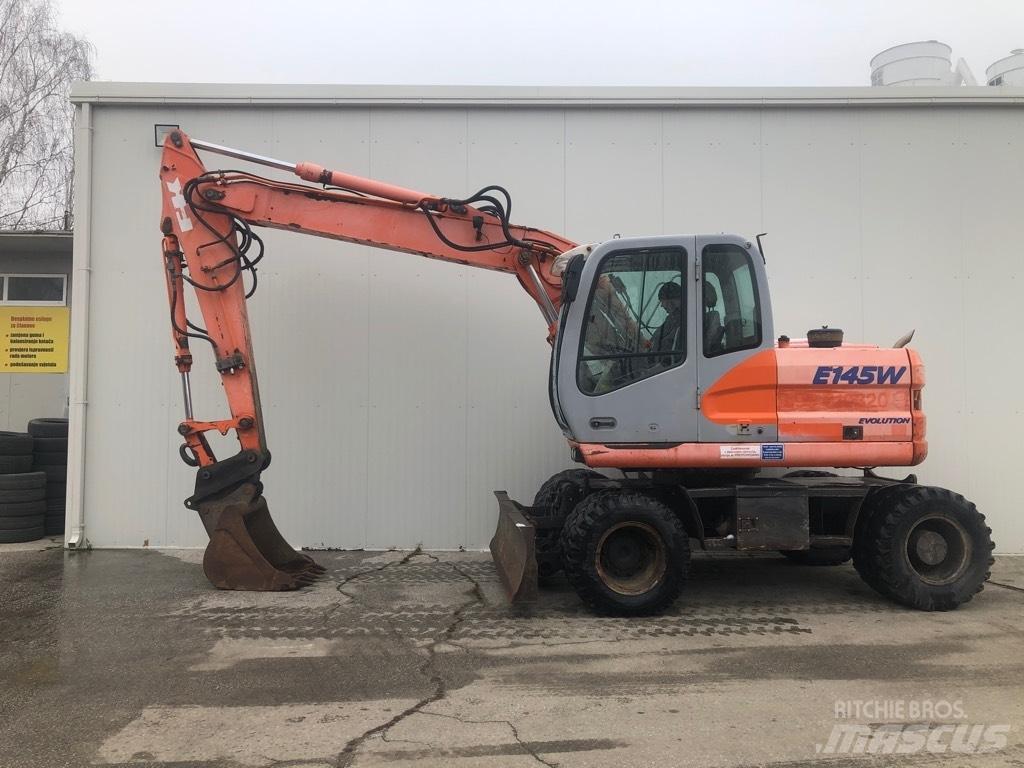 Fiat-Kobelco E 145 W Колёсные экскаваторы