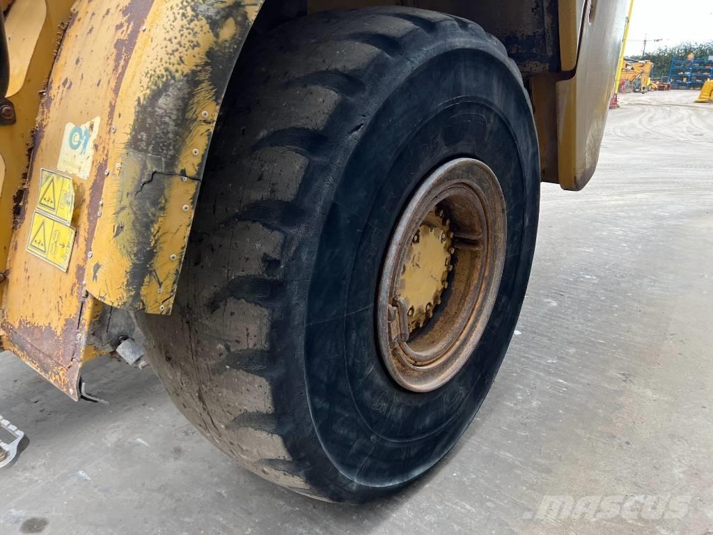 CAT 735 Шарнирно-сочленённые самосвалы