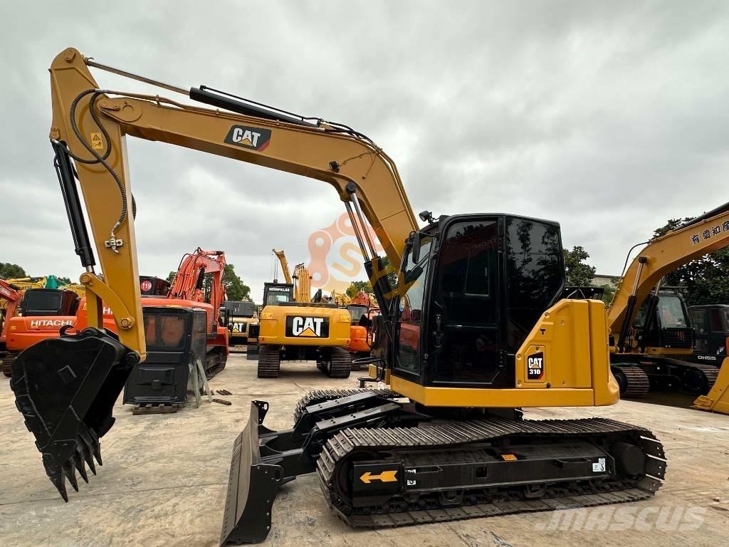 CAT 310 Гусеничные экскаваторы