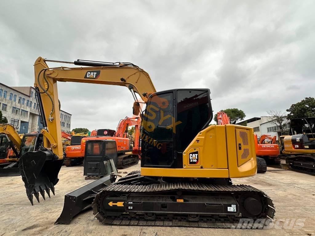 CAT 310 Гусеничные экскаваторы