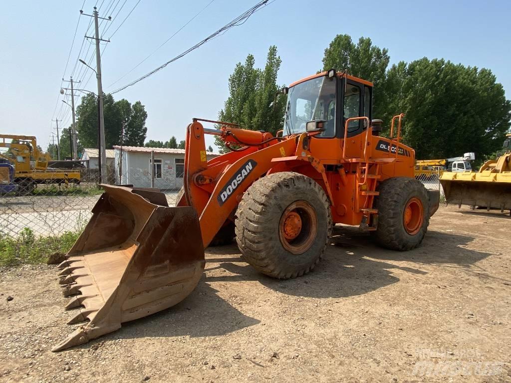 Doosan DL503 Экскаваторы-погрузчики