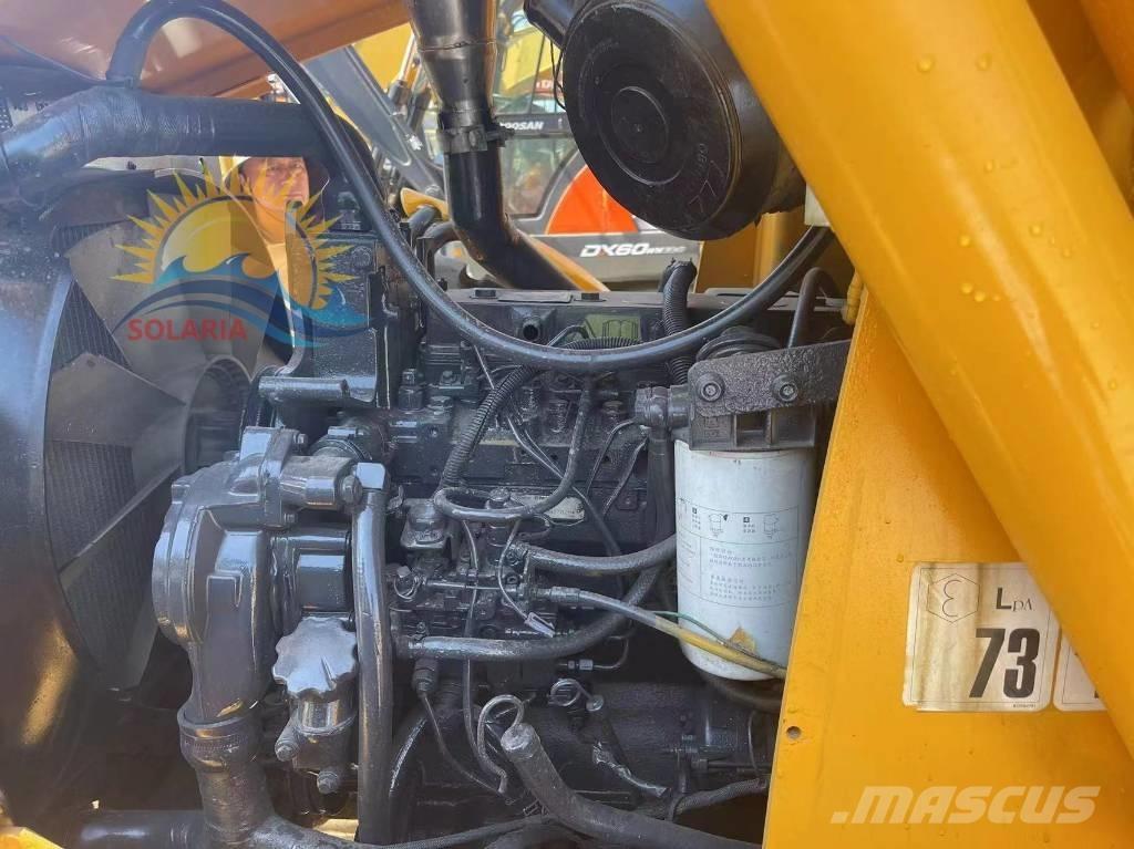 JCB Vibromax 4CX Экскаваторы-погрузчики