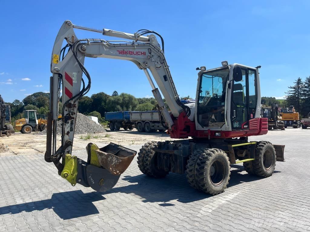 Takeuchi TB 295W Колёсные экскаваторы