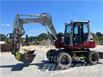 Takeuchi TB 295W Колёсные экскаваторы