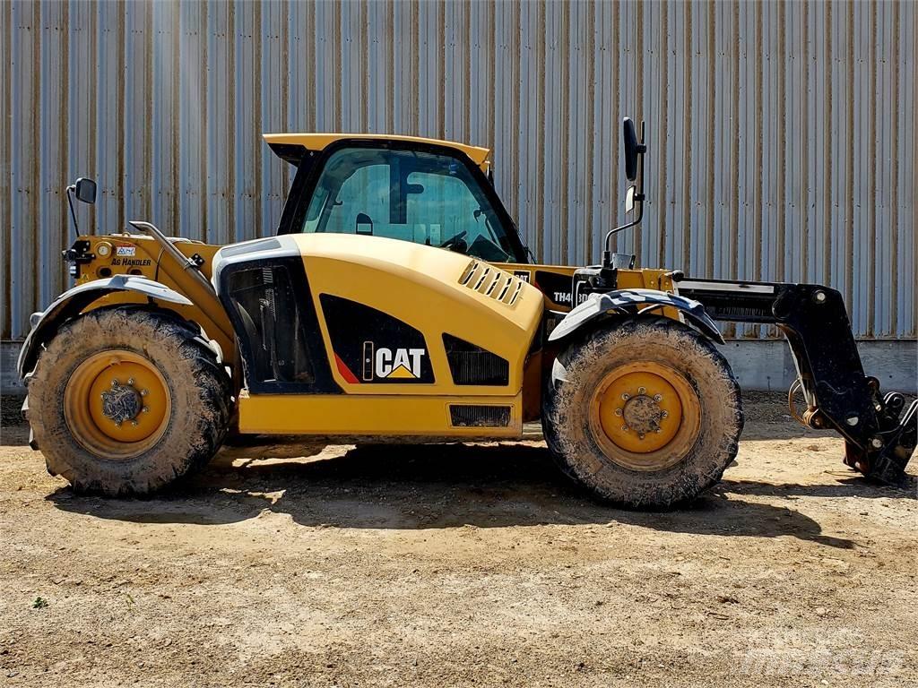 CAT TH408D Строительная техника - Другие
