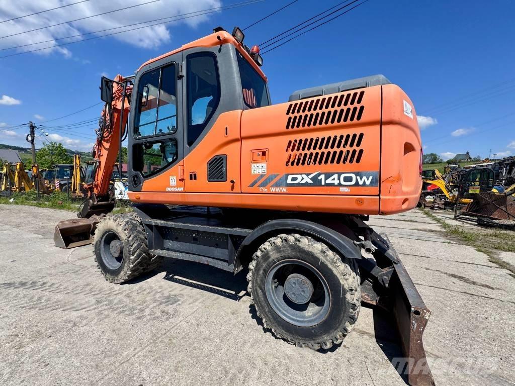 Doosan DX 140 W-3 Колёсные экскаваторы