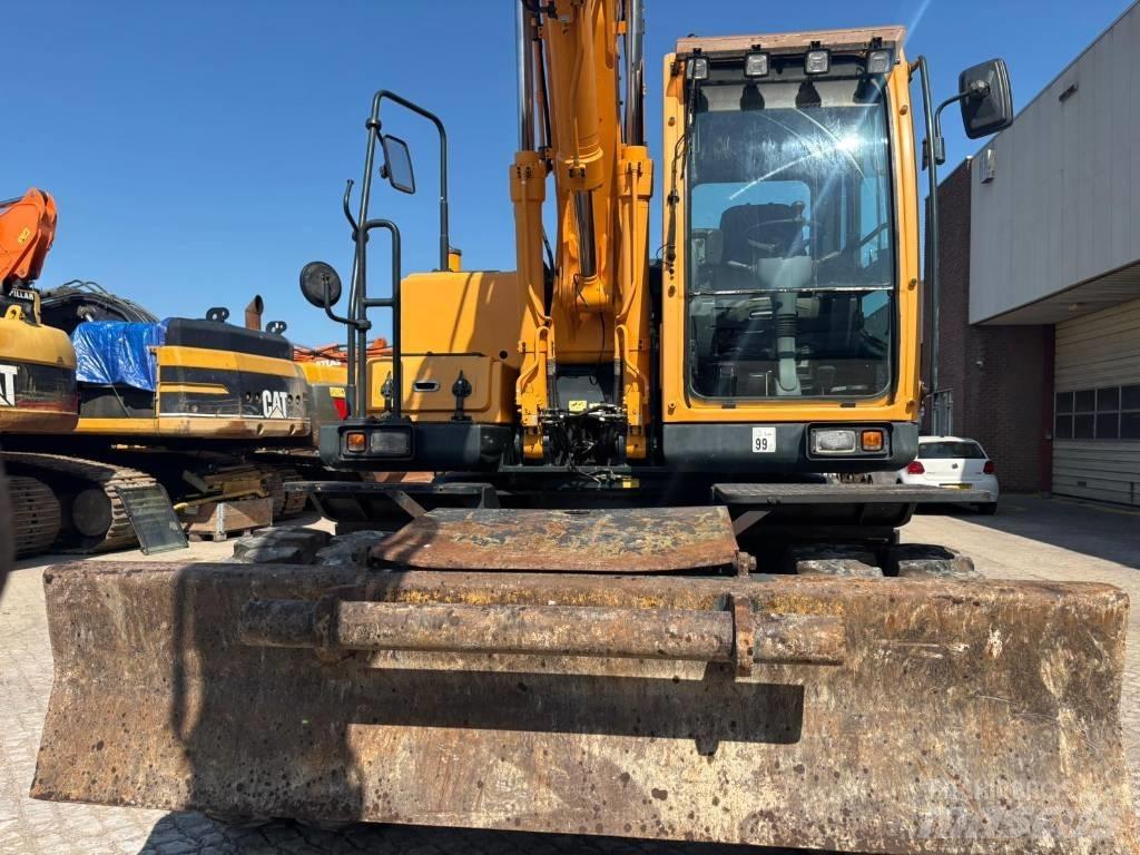 Hyundai 140W-9A Колёсные экскаваторы