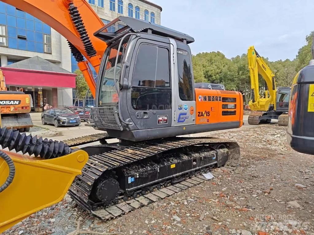 Hitachi ZX 200 Гусеничные экскаваторы