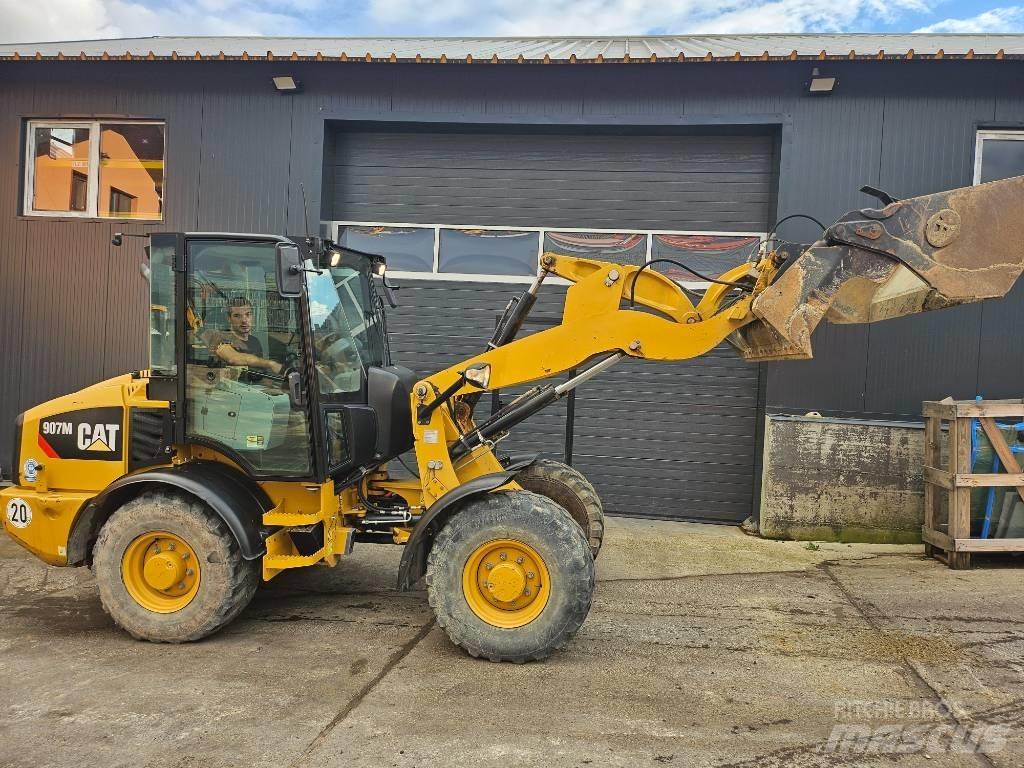 CAT 907M Фронтальные погрузчики