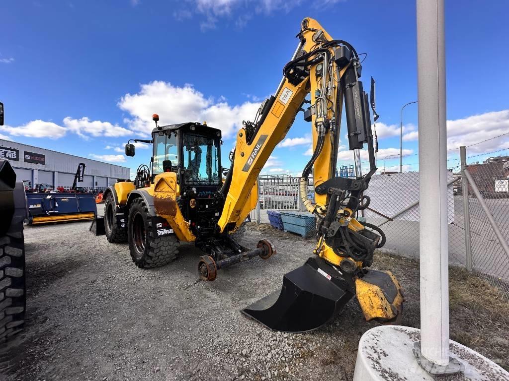 Huddig 1260 C Экскаваторы-погрузчики